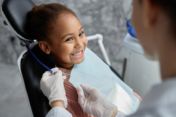 How to Care for Your Child’s Teeth: Tips for Parents and Caregivers